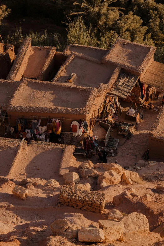 an aerial view of several houses in the desert