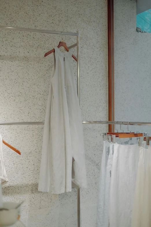 the hanging clothes are hung on a rack