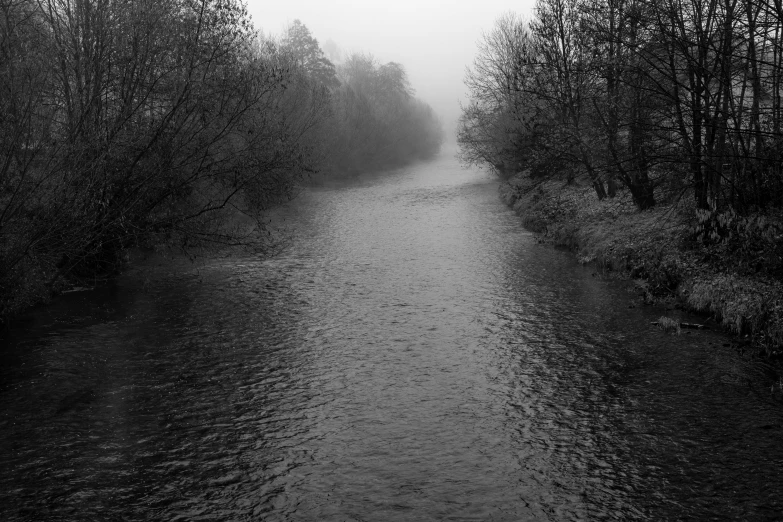 there is a black and white po of a river