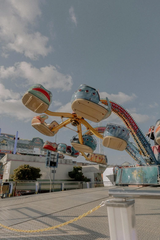 a ferris wheel and other rides in a carnival