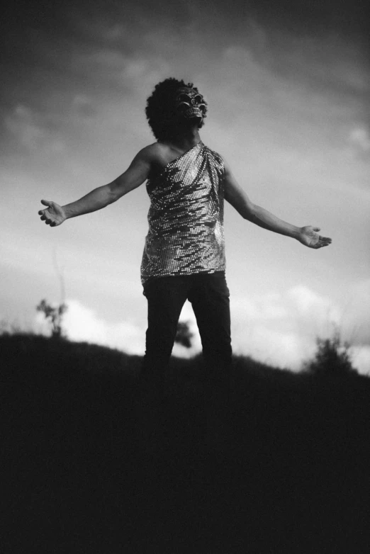 a woman standing on top of a field