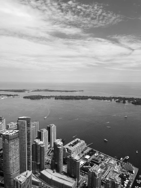 an aerial s of a city and harbor, with the city across from it