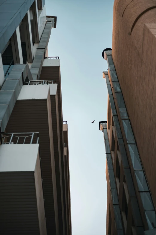 the sky is almost visible from between the buildings