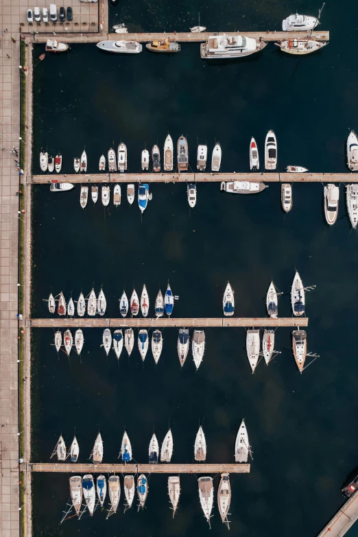 a bunch of boats parked next to each other