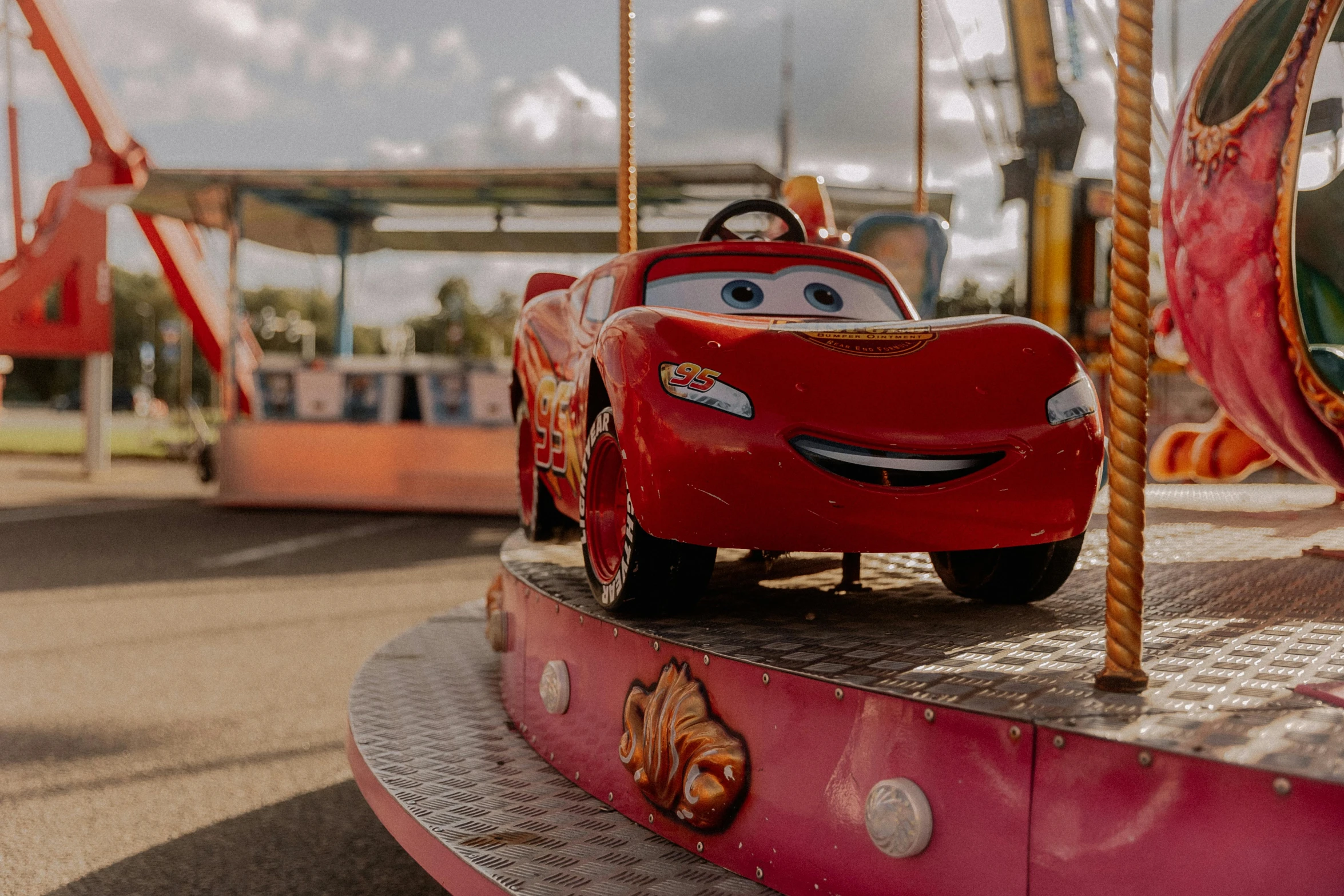 the ride cars are a feature on this playground