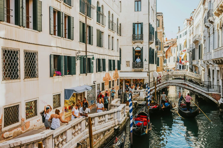 tourists enjoying the scenery in a canals city