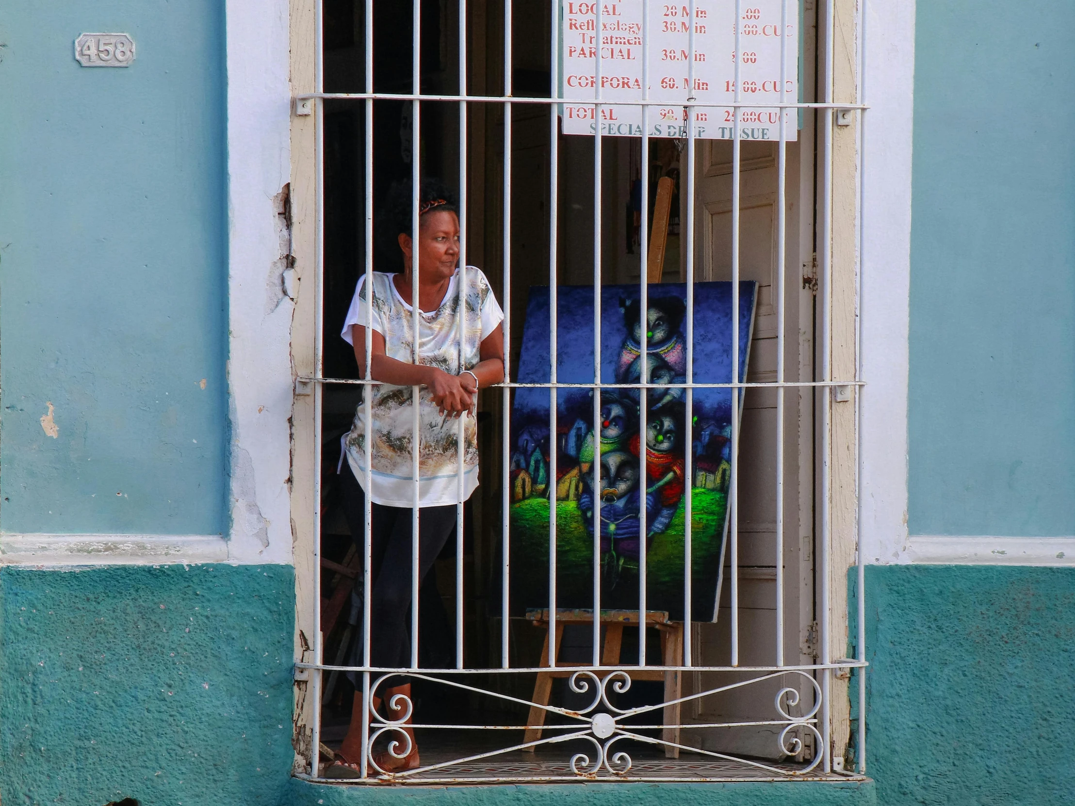 a man standing behind a security wire  cell