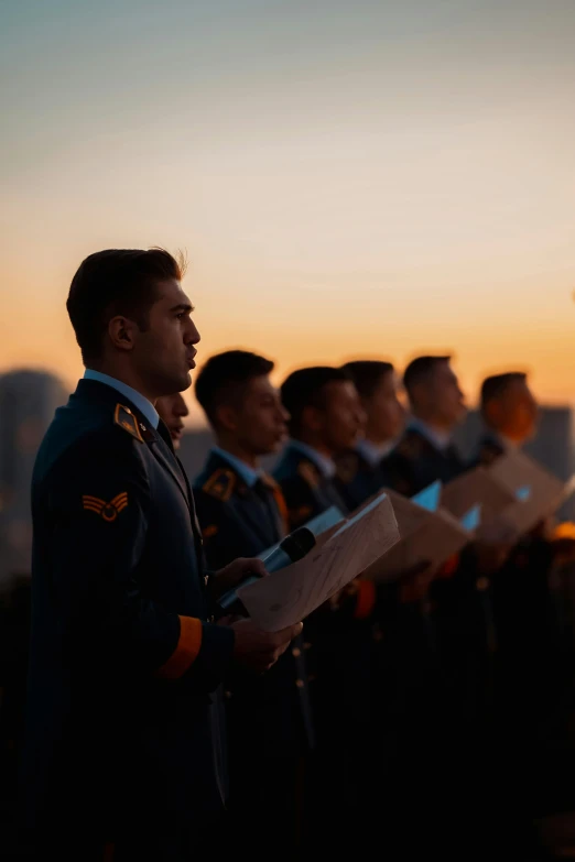 a band of men standing in front of each other