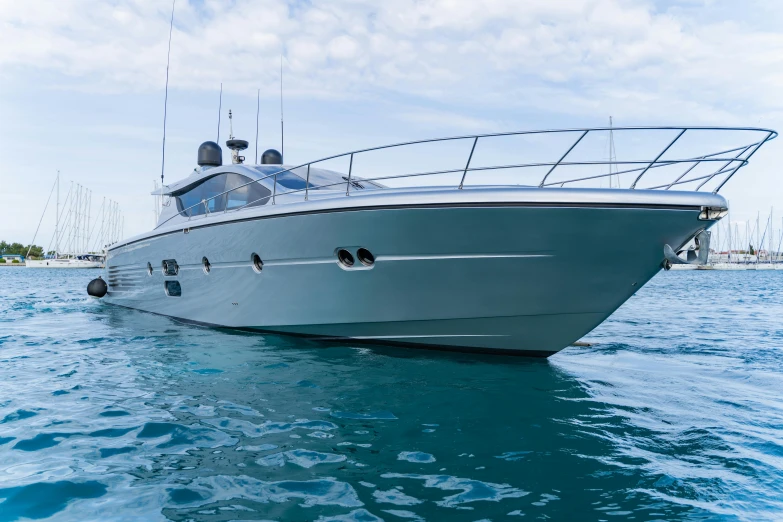 a large gray boat is in the water