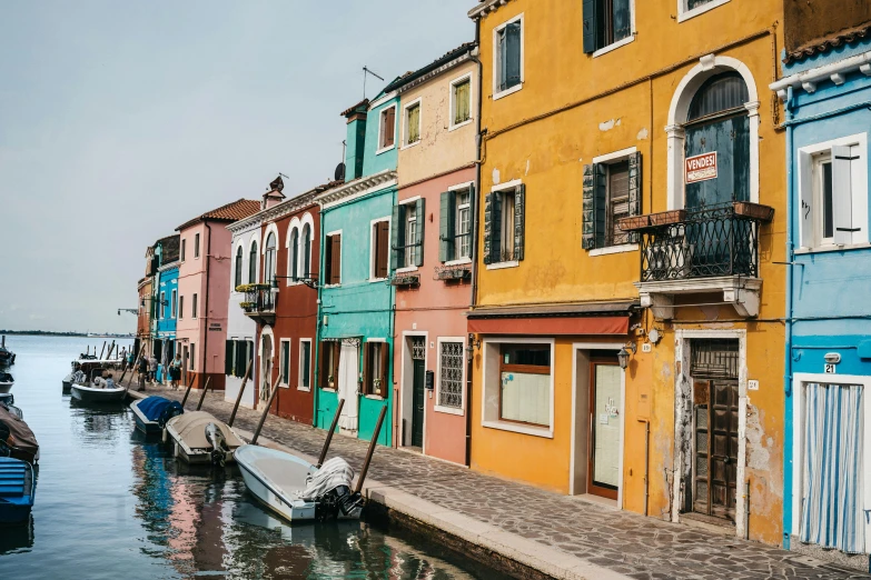 several houses along the side of the water