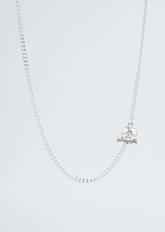 a chain with a diamond on the side