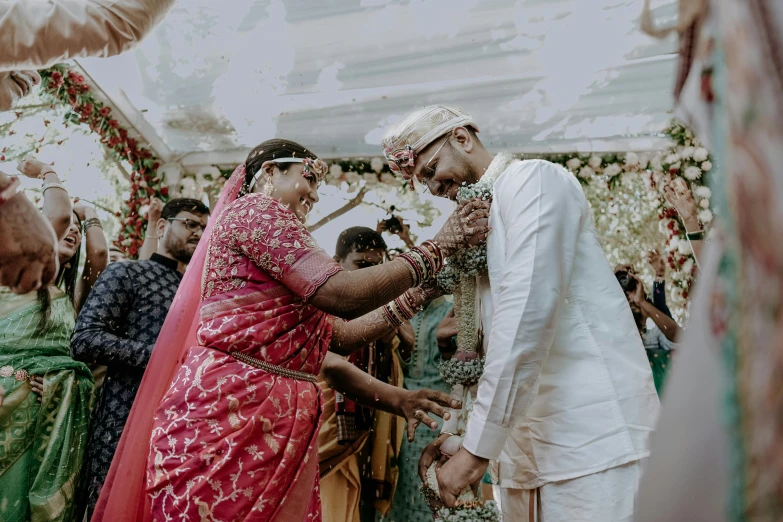 a couple sharing a first look after their hindu ceremony