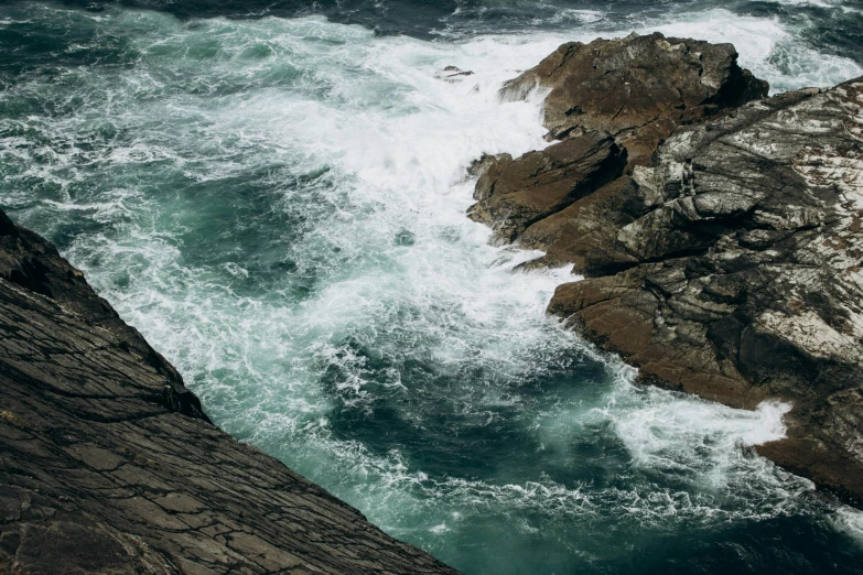 an image of rocky coastline area with water