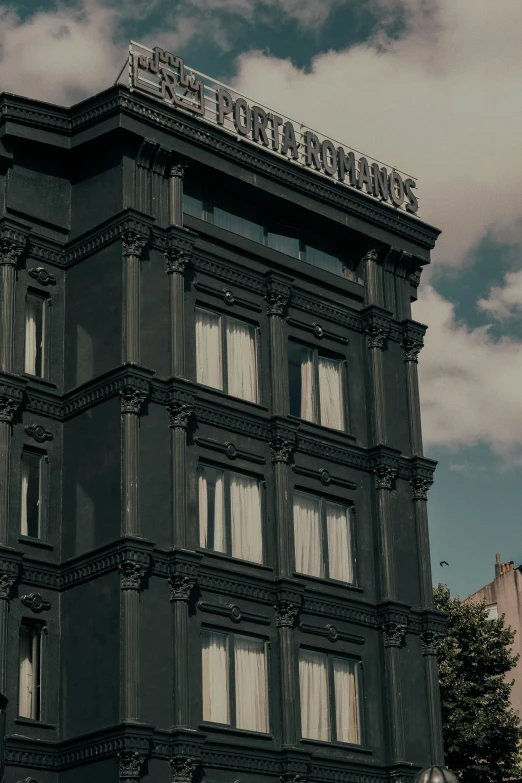 a view of the sign on the front of an old building