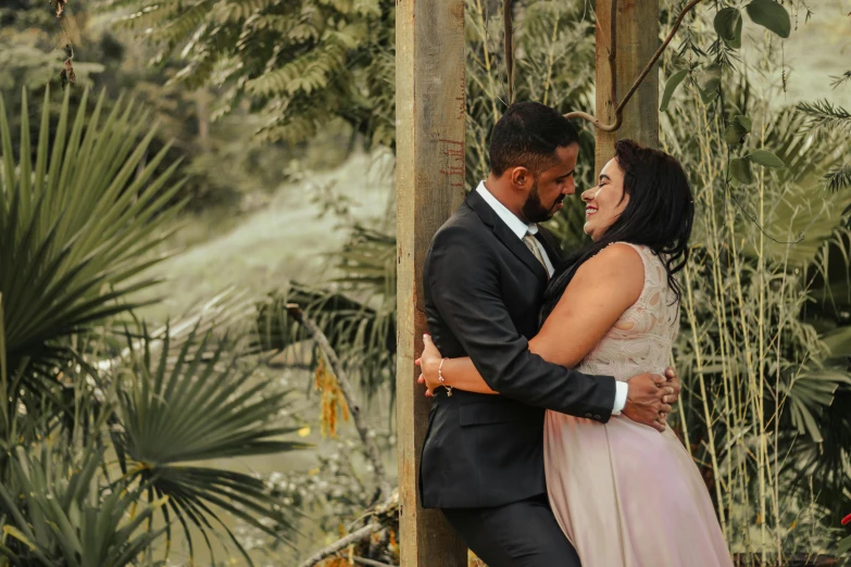 two brides emcing at a jungle wedding