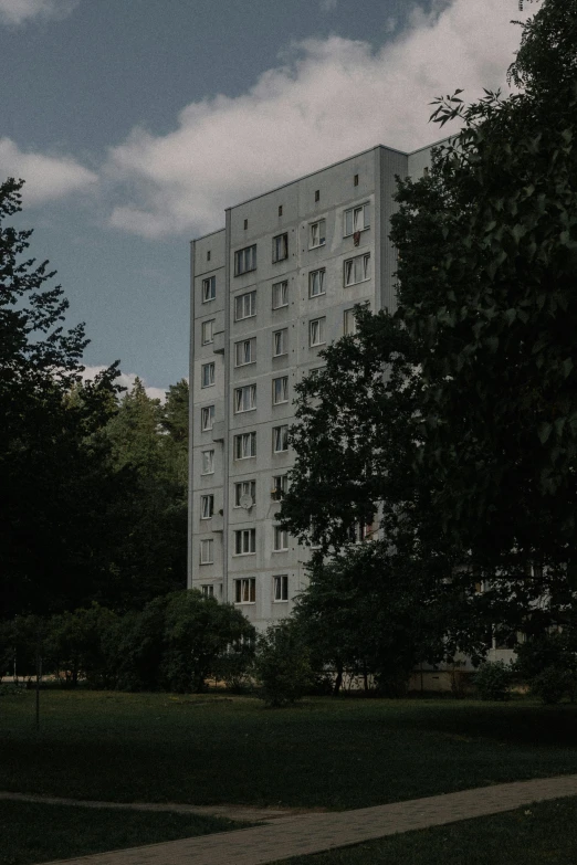 an empty building that looks like a tower with many windows