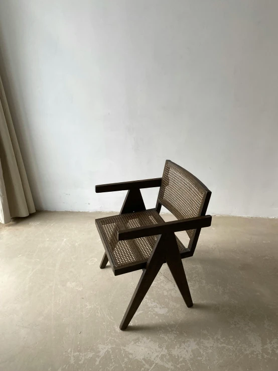 chair by jean van meulek in the living room