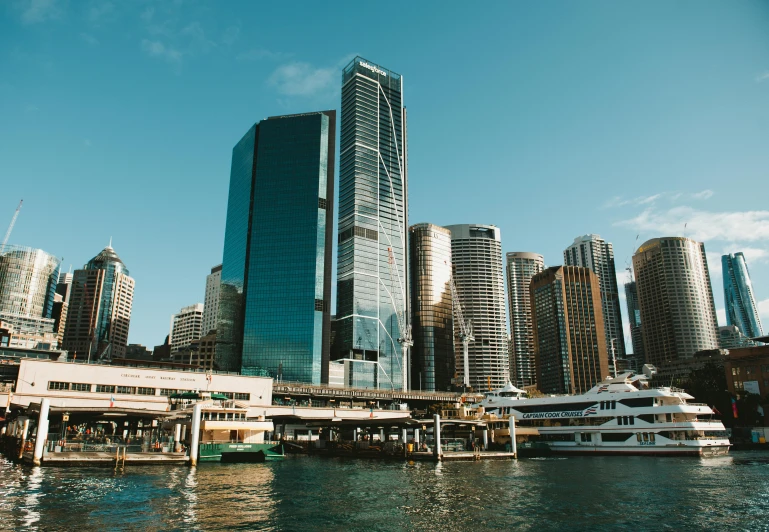 a boat is on the water and near buildings