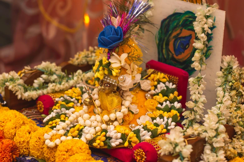 a decorative arrangement of flowers on a table