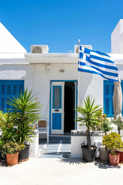 a flag is being displayed on the outside of a house