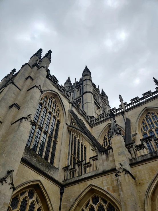 an old gothic styled building with two stories