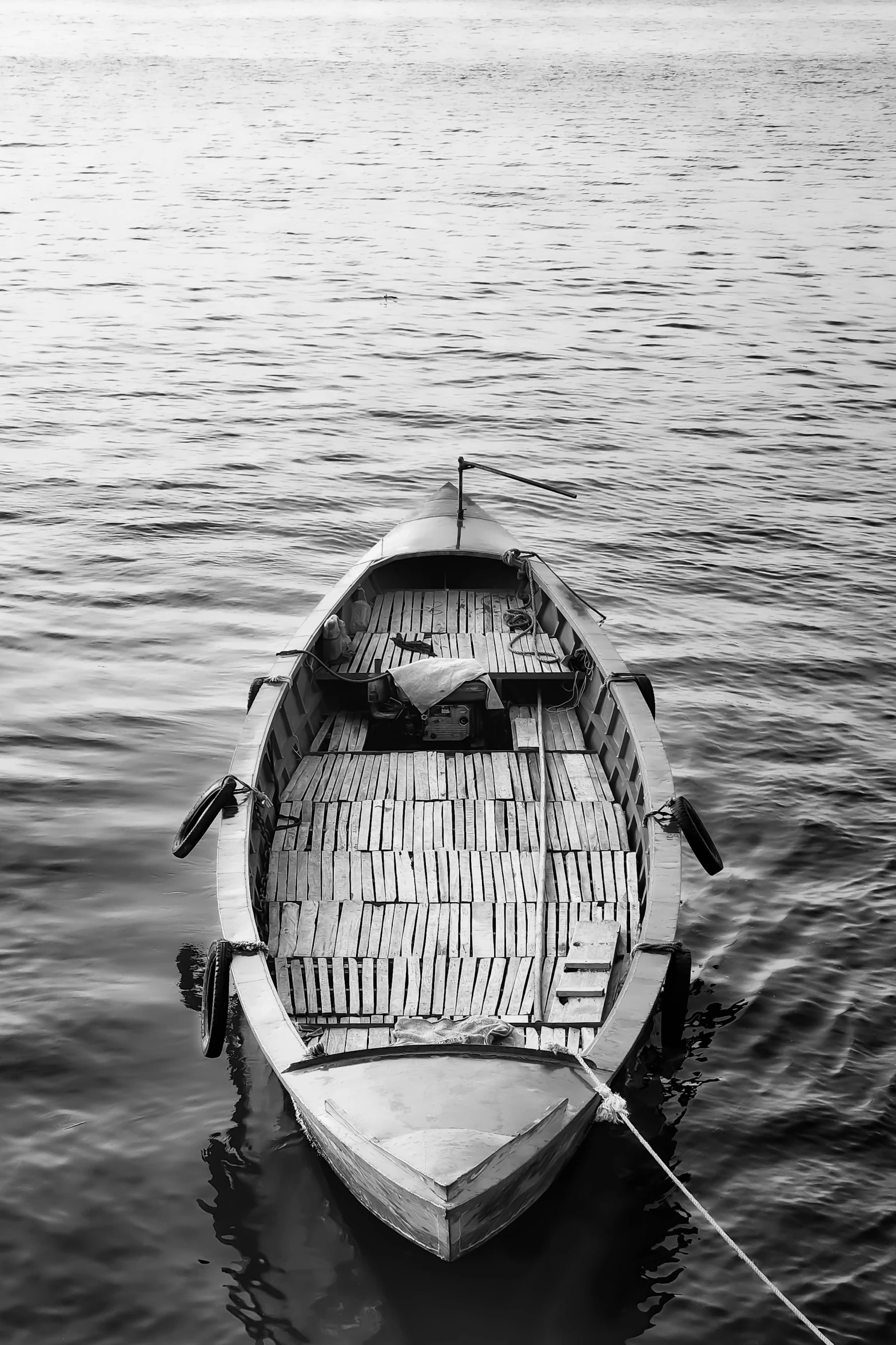 a boat sits in a body of water