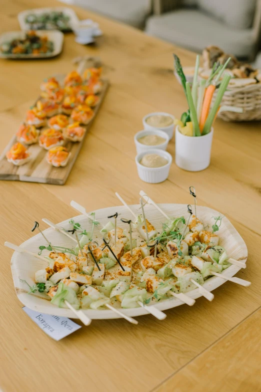 a table with food and desserts on it