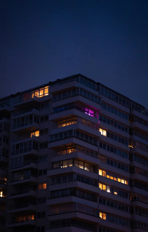 an airplane is flying near a very tall building