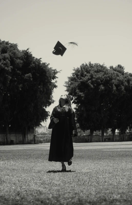 a person with a book flying in the air