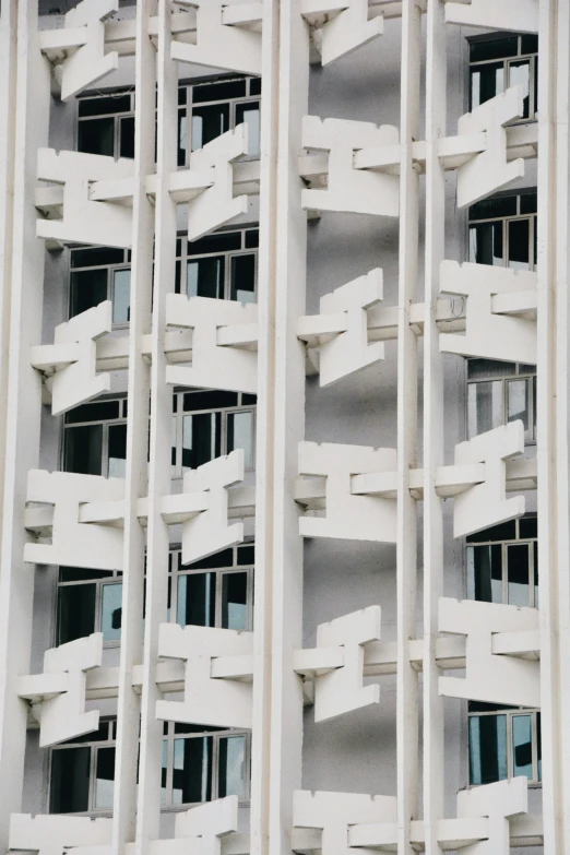 the view of a close up of building with balconies