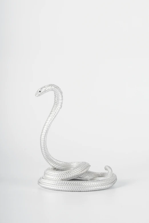 a white snake made of stones on top of each other