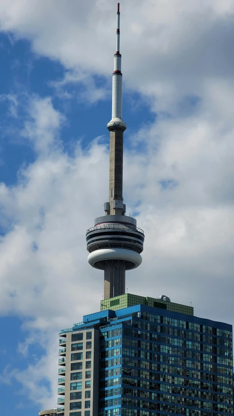 the tall tower has a clock at the top