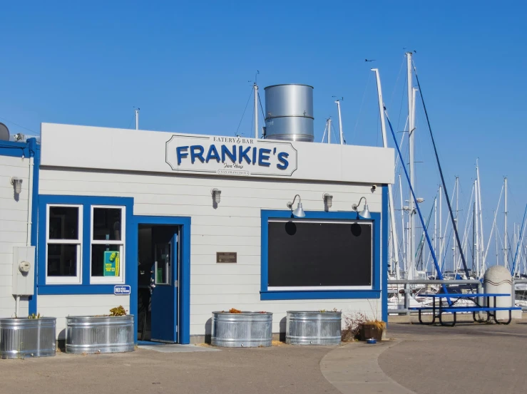 the front entrance of a business called frank's