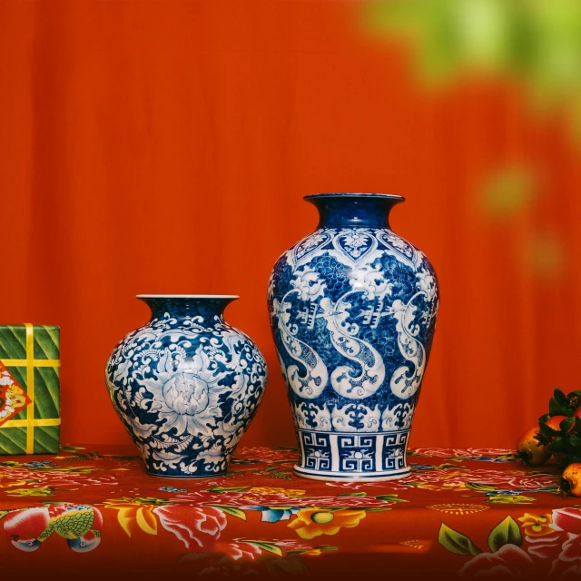 a group of vases are sitting on a table