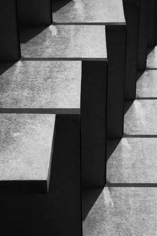 an empty area with four different sized concrete blocks