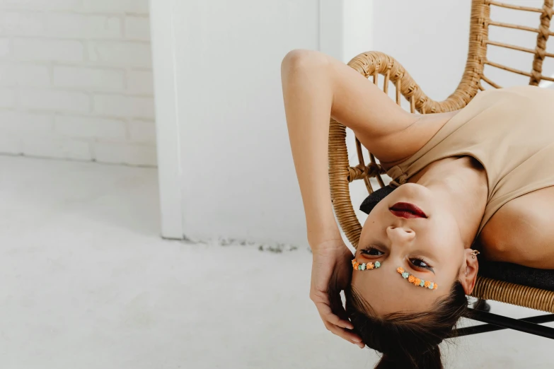 an image of a woman laying on a chair