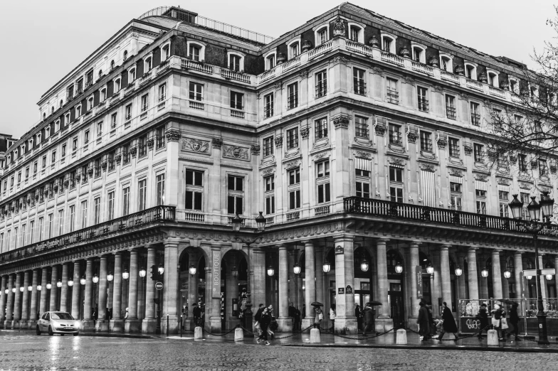 an old building is standing on the street