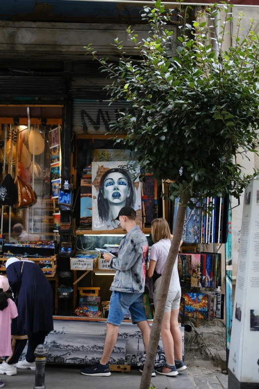 two people talking to each other while in the street