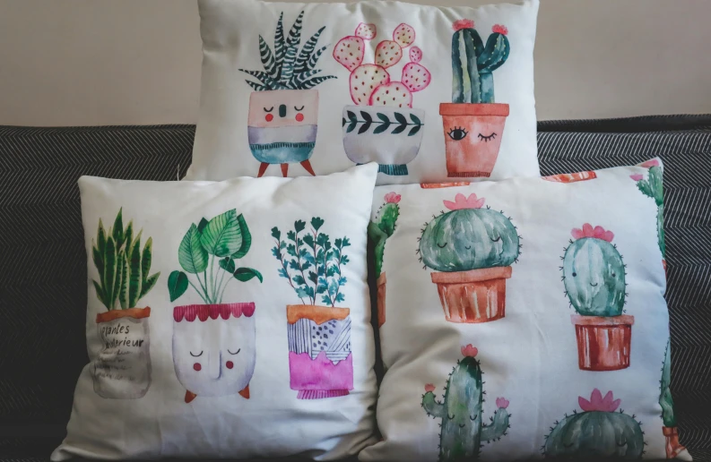 pillows with cactus and cacti on them