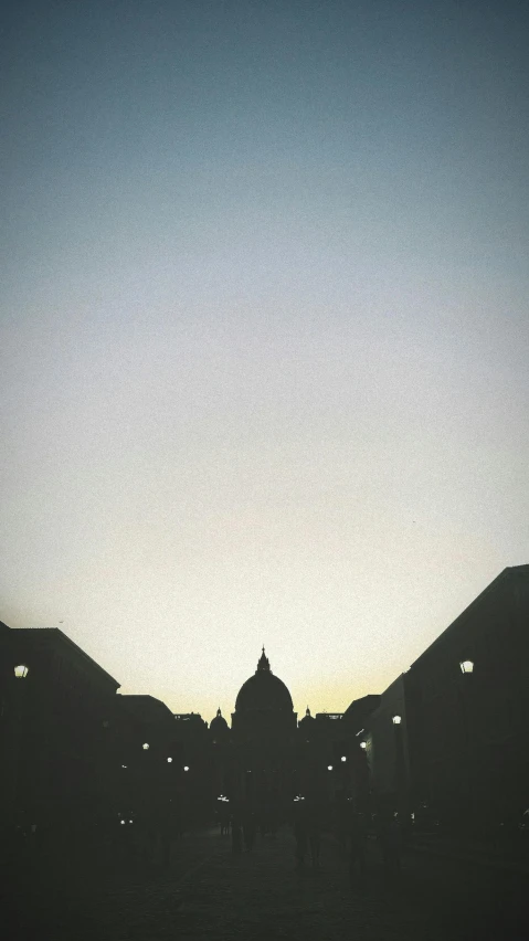 the skyline with a building at the far end and a clear sky in the background