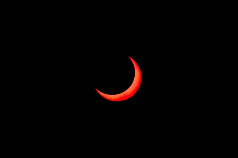 the eclipse on the night sky with dark background