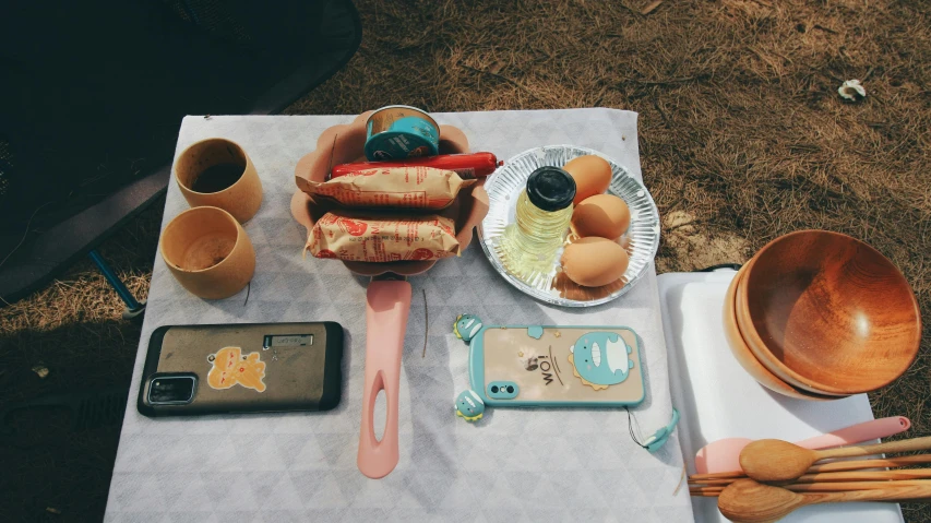 an assortment of food including eggs, sausage and bread