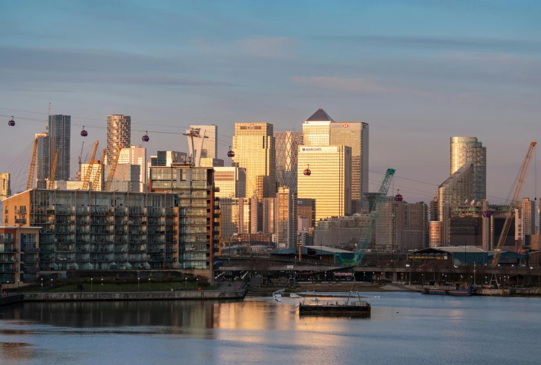 the skyline of a city, as seen over the water