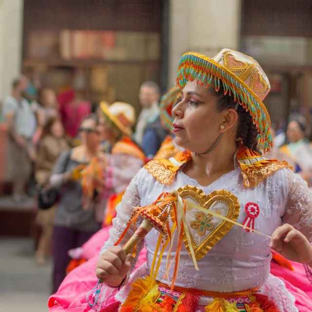 a person is dressed up in costume for the carnival