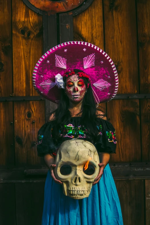 a skeleton in a sombrero and a skull