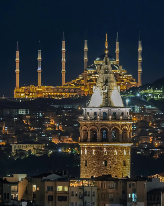 a cityscape at night with some very ornate building