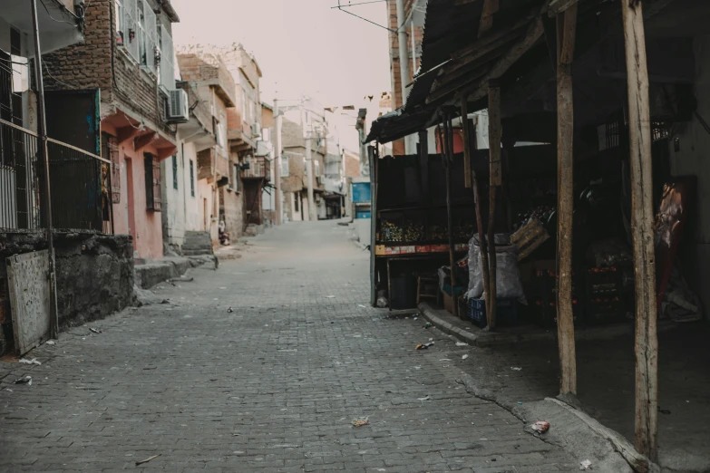 an empty street with several houses around it