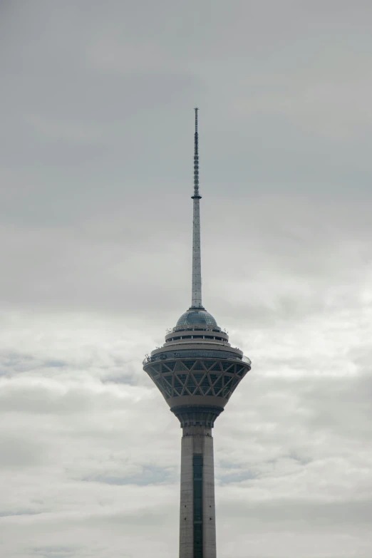 an oriental tower on a cloudy day