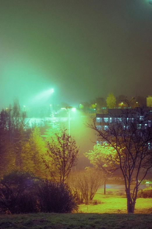a blurry picture of an outdoor stadium with the lights on