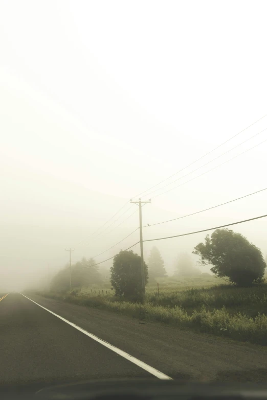 the fog is rolling in the country side roads